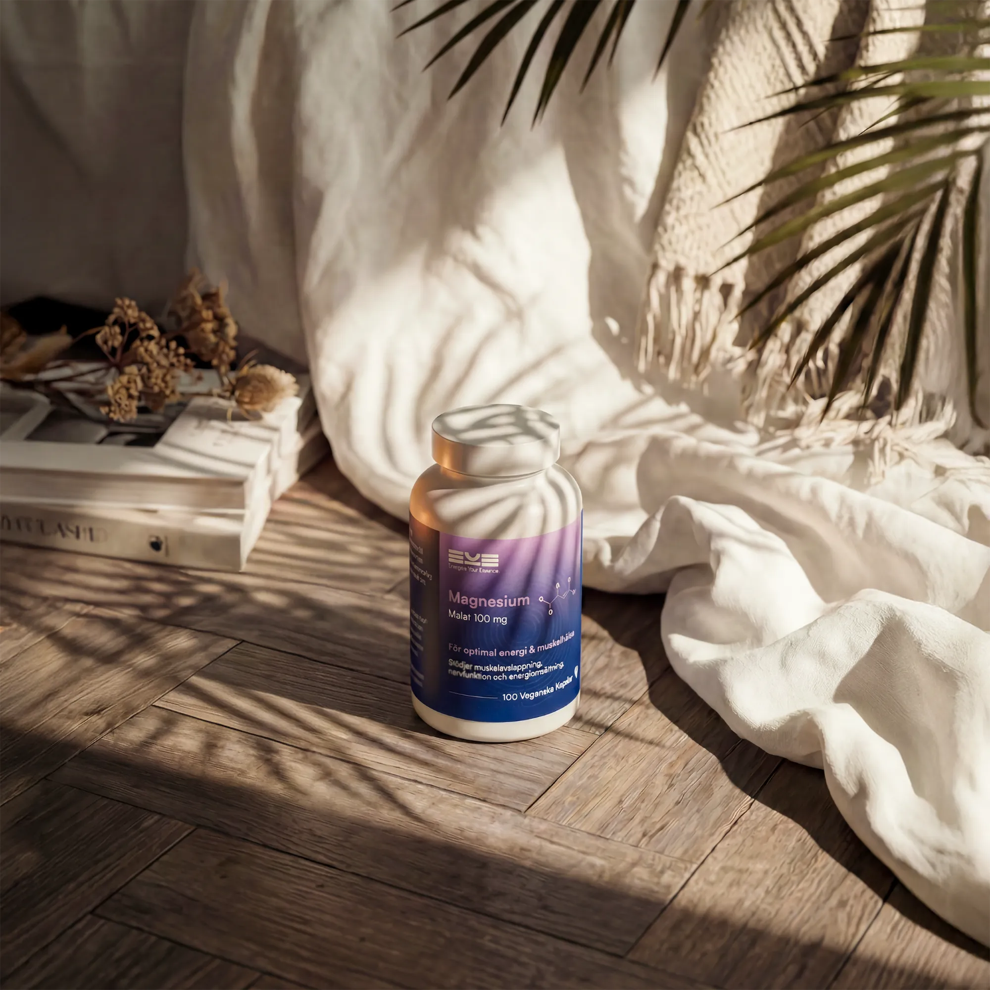 Magnesium malat 100 mg från Energize Your Essence i varm hemmiljö – kosttillskott för energi, återhämtning och muskelavslappning
